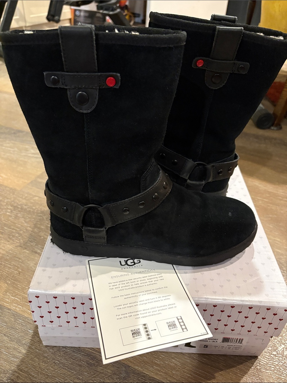 UGG Black Suede Mid-Calf Harness Boots with Red Stud Accent